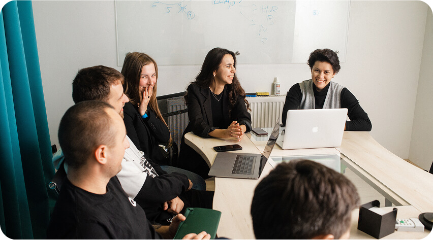custom software development in white colours of image, laptop, modern IT-company, young people coding
